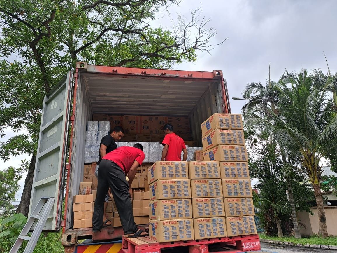 Malaysian manufactured products loaded into a shipping container for export